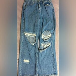 Baggy ripped blue jeans